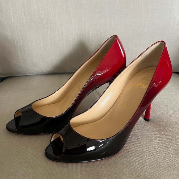 Striking Louboutin Red and Black High Heels with Peep-Toe Design - Picture 3 of 9